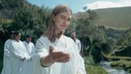 Before everything unravels in Shaman, Candice leads baptisms, yoking charity to conversion (Image via Apple TV+)